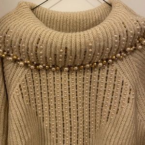 White sweater with pearls and beads